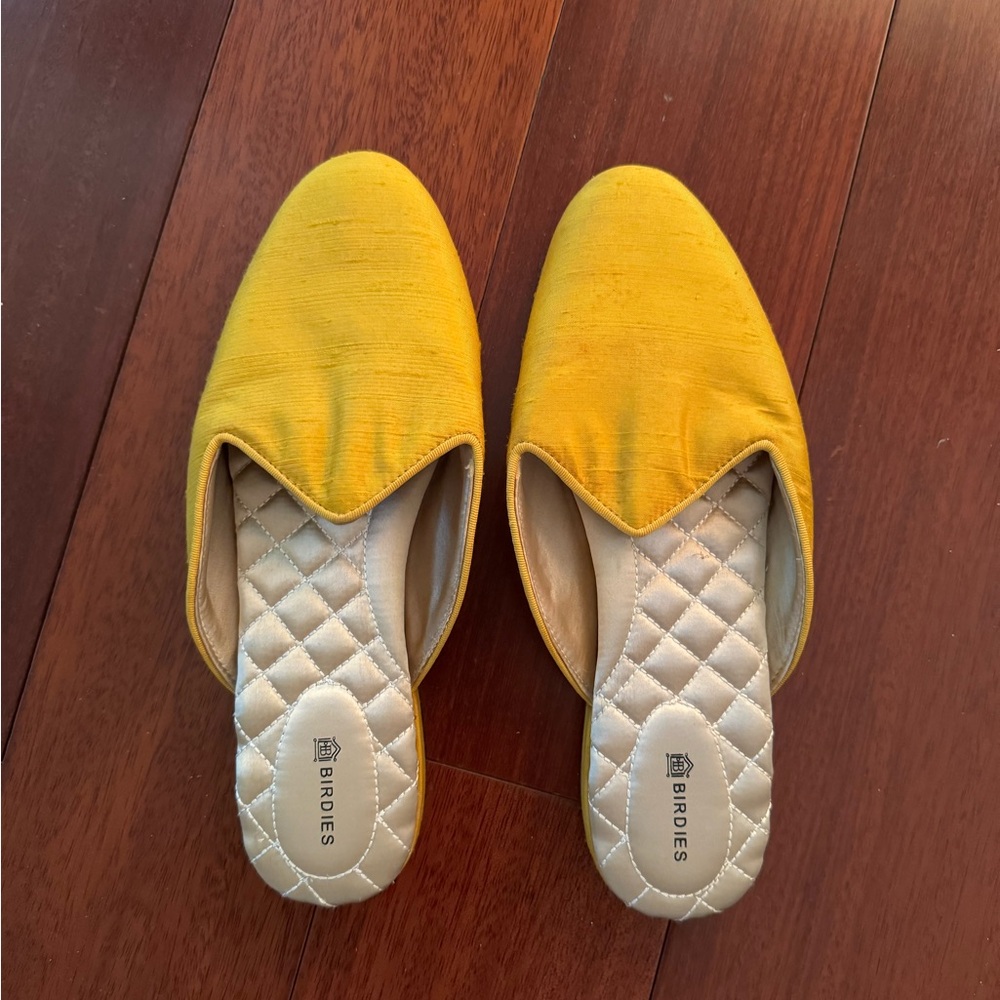 Worn only once. In good condition but the top is stiff.